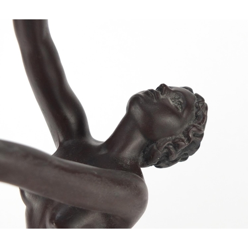 2078 - Bronzed table lamp in the form of a nude Art Deco dancer with globular glass shade, 69cm high