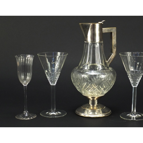 2184 - **WITHDRAWN ** French Art Deco cut glass claret jug with silver plated mount and five glasses, possi... 