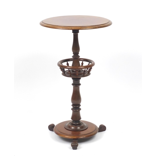 2059 - Victorian turned mahogany occasional table with galleried centre tier, 69cm high by 40cm in diameter