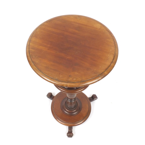 2059 - Victorian turned mahogany occasional table with galleried centre tier, 69cm high by 40cm in diameter