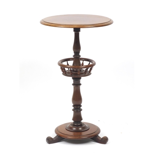 2059 - Victorian turned mahogany occasional table with galleried centre tier, 69cm high by 40cm in diameter