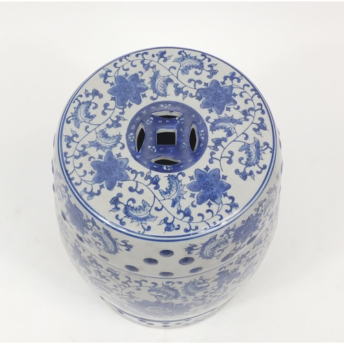 2066 - Chinese blue and white porcelain garden seat decorated with flowers, 45.5cm high