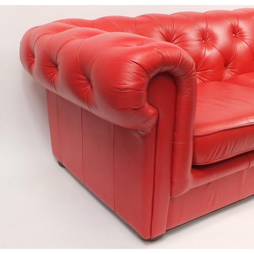 2063 - Red leather buttonback Chesterfield settee, 200cm wide