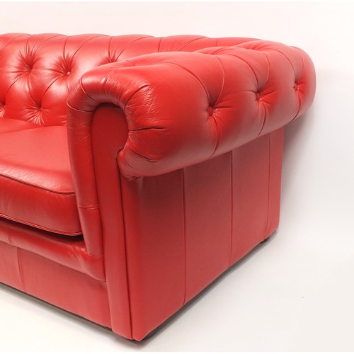 2063 - Red leather buttonback Chesterfield settee, 200cm wide