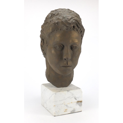 2081 - Modernist bust of a gentleman raised on a white marble base, 44cm high