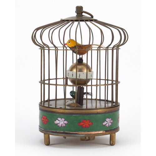2138 - Clockwork automaton enamel bird cage alarm clock, 20cm high
