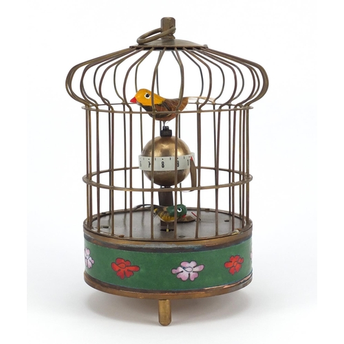 2138 - Clockwork automaton enamel bird cage alarm clock, 20cm high