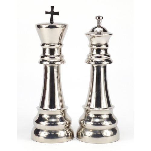 2163 - Two novelty oversized king and queen chess pieces, the larger 34.5cm high