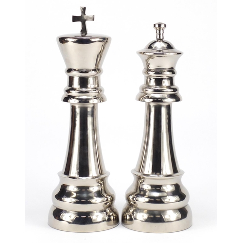 2163 - Two novelty oversized king and queen chess pieces, the larger 34.5cm high