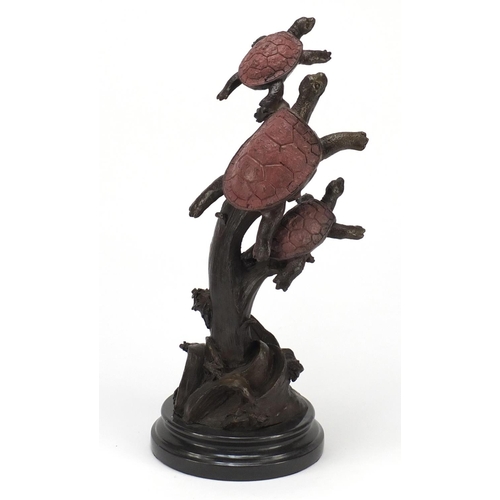 2160 - Patinated bronze sculpture of three sea turtles, raised on a circular marble base, 41cm high