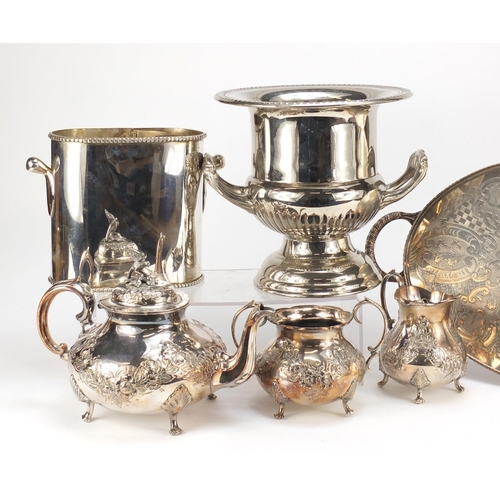 2152 - Silverplate including two champagne buckets and a three piece teaset, the largest 55cm high