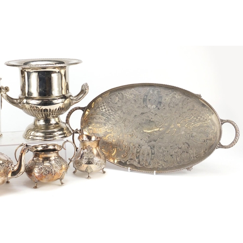 2152 - Silverplate including two champagne buckets and a three piece teaset, the largest 55cm high