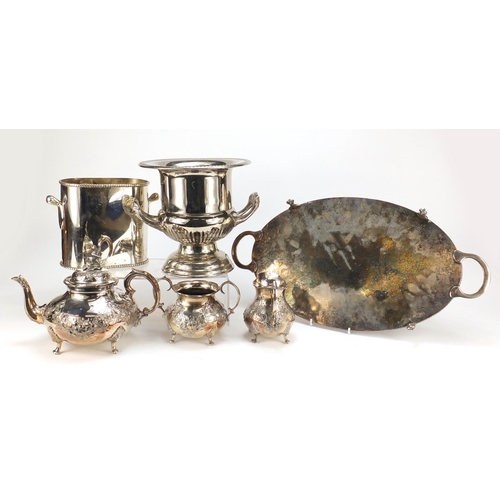2152 - Silverplate including two champagne buckets and a three piece teaset, the largest 55cm high