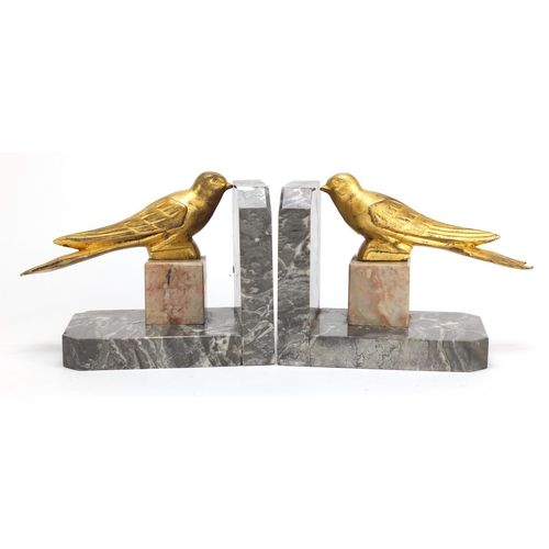 2111 - Pair of Art Deco marble and gilt bird design bookends, each 16.5cm high