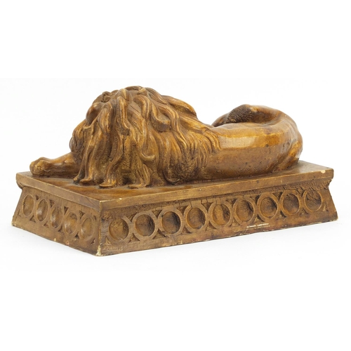 2170A - Marble style sculpture of a sleeping lion, 25.5cm wide