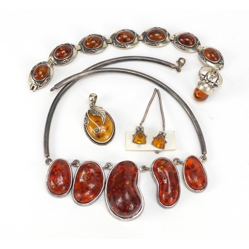 2357 - Silver and amber jewellery comprising necklace, bracelet, pendant, ring and earrings, 115.0g