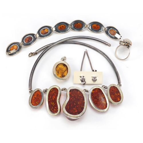 2357 - Silver and amber jewellery comprising necklace, bracelet, pendant, ring and earrings, 115.0g