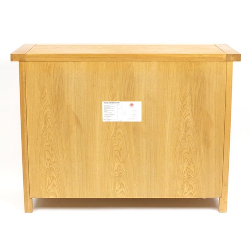2030 - Contemporary light oak side unit fitted with two drawers above a pair of cupboard doors, 85.5cm H x ... 