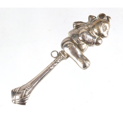 2353 - Novelty silver babies rattle in the form of a teddy bear, 12.5cm in length, 24.0g