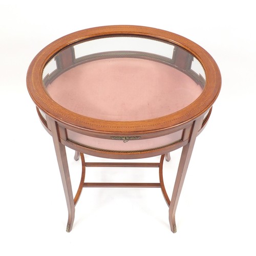 2016 - Oval inlaid mahogany bijouterie table with bevelled glass top, 76cm H x 59cm wide x 47cm D