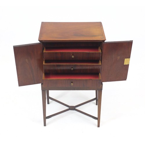 2033 - Early 19th century mahogany collector's cabinet on stand, fitted a pair of doors enclosing four draw... 