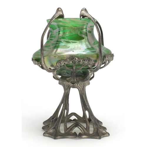 563 - Art Nouveau pewter stand housing an iridescent green glass vase in the style of Loetz, 25cm high