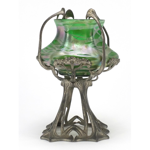 563 - Art Nouveau pewter stand housing an iridescent green glass vase in the style of Loetz, 25cm high