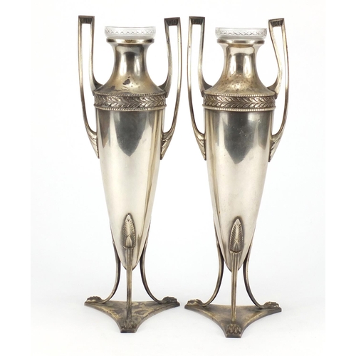 586 - Pair of Art Nouveau silver plated vases with glass liners by WMF, each 32cm high