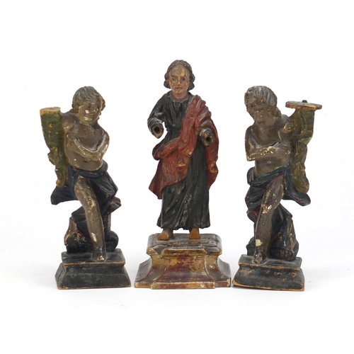 122 - Three 18th century polychrome painted carved wood figures 16.5cm high