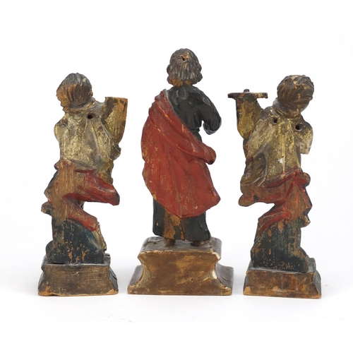 122 - Three 18th century polychrome painted carved wood figures 16.5cm high