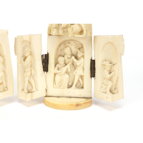 130 - Rare pair of 19th century Dieppe carved ivory triptych figures, largest 8.5cm high