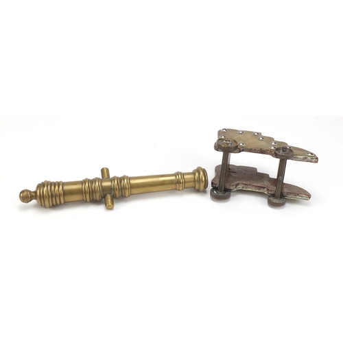 97 - Antique brass table cannon and carriage, 24.5cm in length