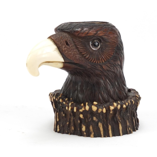 121 - Novelty carved horn eagle design desk inkwell with ivory beak and beaded eye, 9cm high