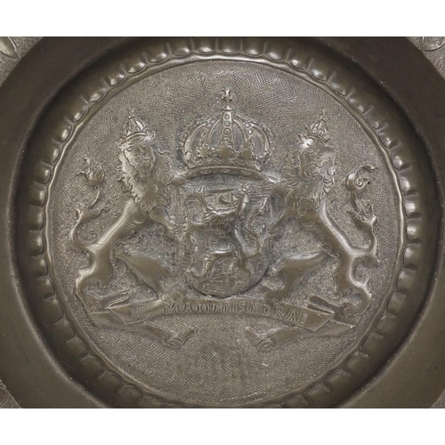 112 - Antique pewter wall plaque embossed with a coat of arms 34.5cm in diameter