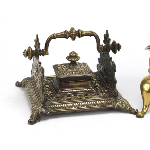 103 - Victorian brass inkstand and a miniature Georgian brass footman, the largest 17cm wide