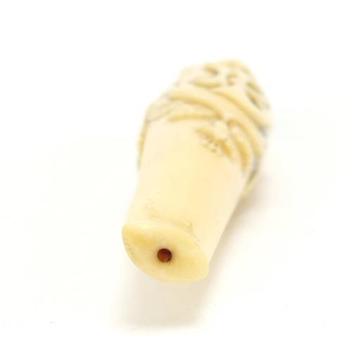 124 - Victorian carved ivory cigarette holder housed in a tooled leather velvet lined case, 11cm in length