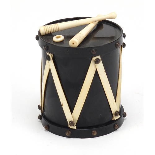 131A - 19th century turned wood and ivory Go-to-bed match striker in the form of a drum, 6cm high