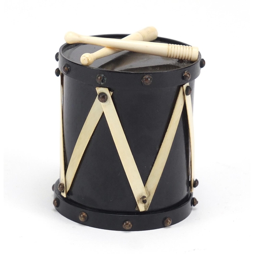 131A - 19th century turned wood and ivory Go-to-bed match striker in the form of a drum, 6cm high