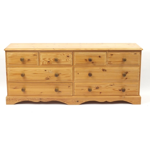 45 - Pine eight drawer chest, 76cm H x 178cm W x 43cm D