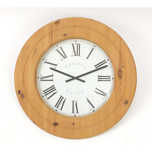 16 - Large pine framed Tempus Fugit wall clock, 72cm in diameter