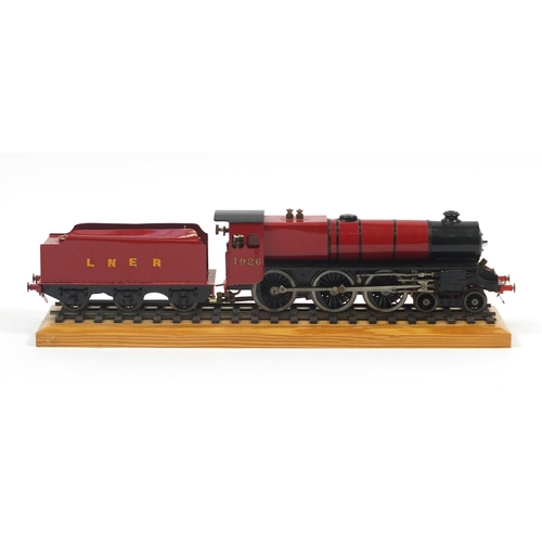 143 - Large model locomotive with LNER tender and perspex display case, 63.5cm in length