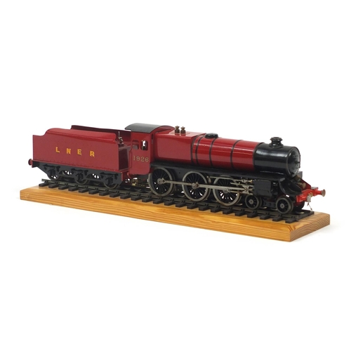 143 - Large model locomotive with LNER tender and perspex display case, 63.5cm in length