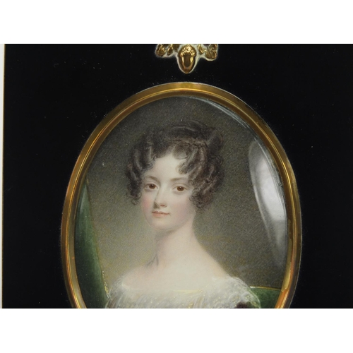 41 - 19th century oval hand painted portrait miniature of a young female, housed in an ebonised frame, 9.... 