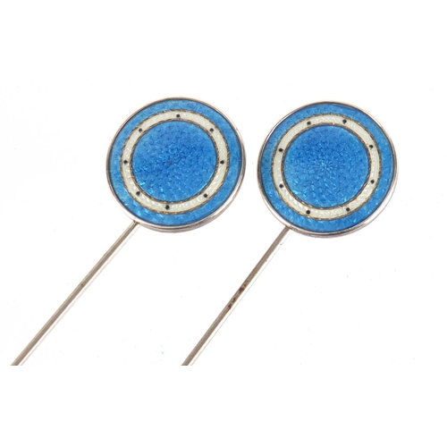 15 - Pair of sterling silver and blue guilloche enamel hat pins, each 22.4cm in length