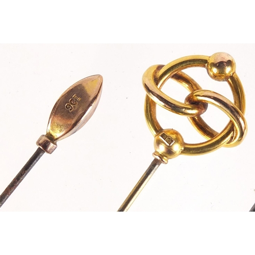 19 - Four Art Nouveau 9ct gold hat pins, the largest 19.5cm in length