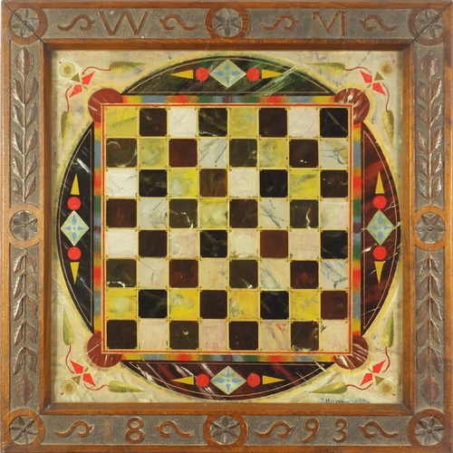 148 - 19th Century glass chess board by T Morrison, housed in a carved oak frame dated 1893, overall 66.5c... 