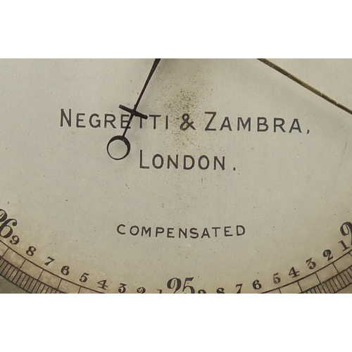 99 - Military interest brass cased compensated barometer by Negretti & Zambra of London with engraved cro... 