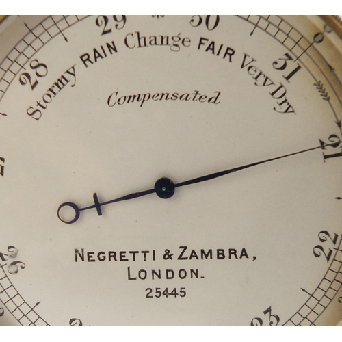 99 - Military interest brass cased compensated barometer by Negretti & Zambra of London with engraved cro... 