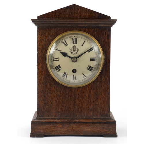 87 - British military World War II RAF Officer's mess clock housed in an oak case, the movement stamped S... 