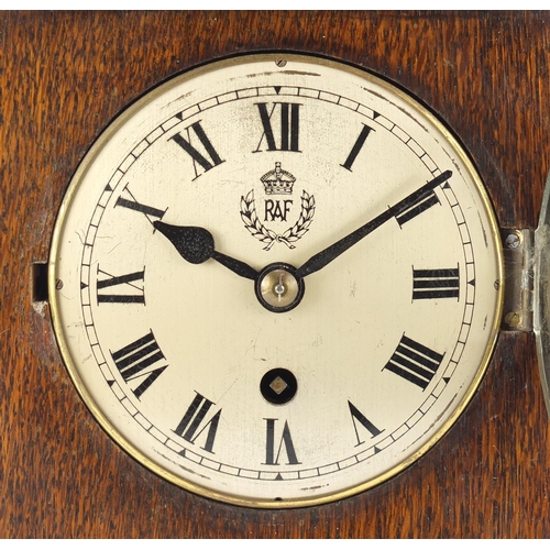 87 - British military World War II RAF Officer's mess clock housed in an oak case, the movement stamped S... 